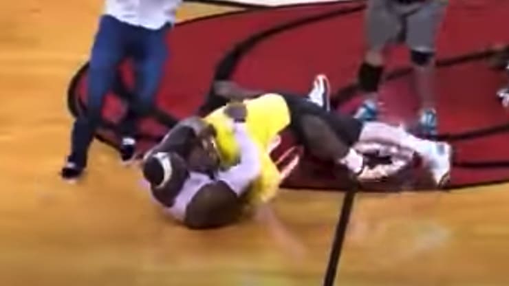 VIDEO: Remembering When LeBron James Tackled This Miami Heat Fan After Hitting a Half-Court Shot to Win $75k